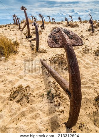 Natural Cemetery Of Marine Anchors At Barril Beach, Portugal