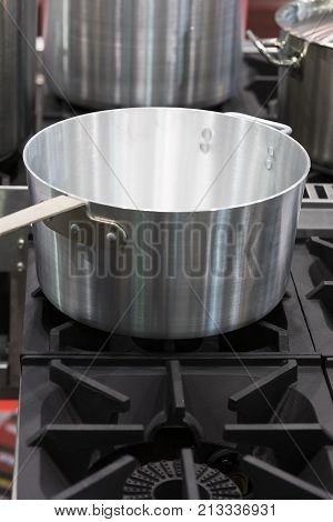 Metal stainless steel pan on a kitchen stove