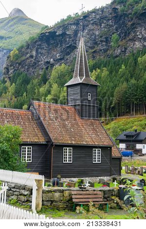 Flam is a village in Flamsdalen at the inner end of the Aurlandsfjorden a branch of Sognefjorden. The village is located in the municipality of Aurland in Sogn og Fjordane county Norway.