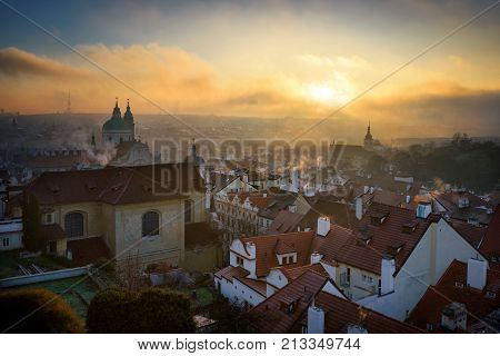 Misty Saint Nicolas Church And Lesser Town Area. Prague, Czech Republic