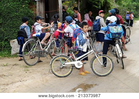 Asian Pupil Cycling Go To School
