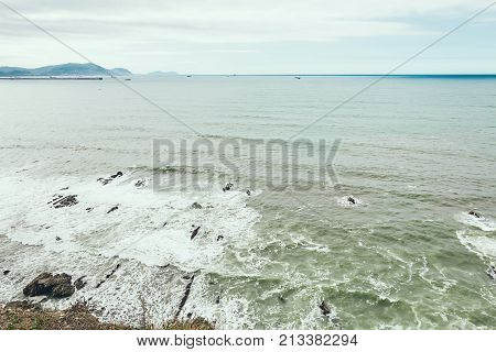 A top view on the beach of Getxo of the Atlantic ocean in Bilbao on the North of Spain.