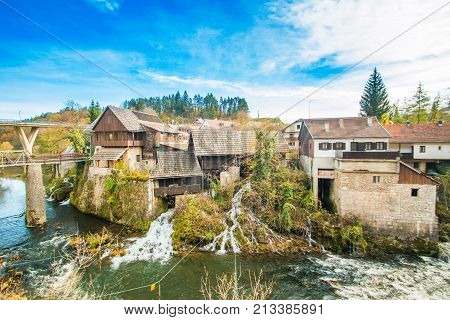 Village of Rastoke near Slunj in Croatia, old water mills on waterfalls of Korana river, beautiful countryside landscape