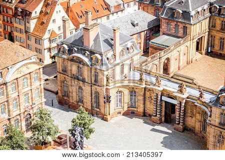Aerial cityscape view on the old town with courtyard of Rohan palace in Strasbourg city in France