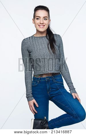 Smiling funky woman looking to the side out of frame