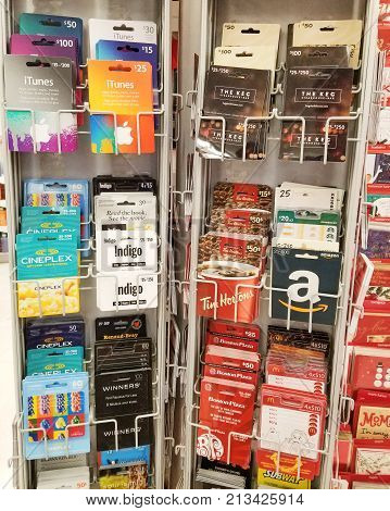 Montreal Canada - November 7 2017: Different Brands Such As Tim Hortons Amazon Itunes Indigo Boston 