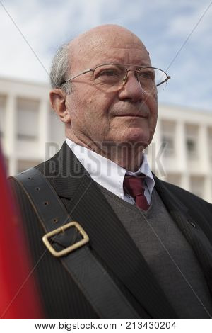 Aubagne, France. May 11, 2012. Portrait of a veteran of the French foreign legion with the banner of veterans of the foreign legion during the annual meeting of veterans.