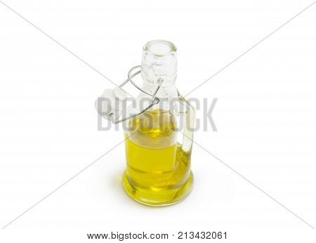 Small glass bottle of olive oil with open lockable lid on a white background
