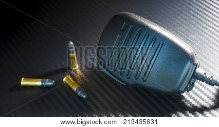 Three slim rim fire bullets with a police microphone