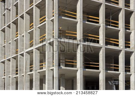 Floors. Fragment of the wall of the unfinished building.