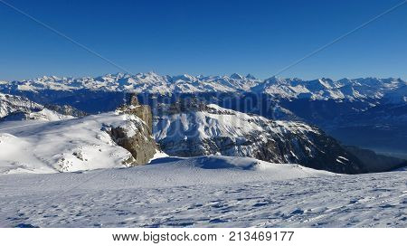 View from the Diablerets glacier Switzerland. Snow covered mountains in Valais Canton. Winter scene in the Swiss Alps.