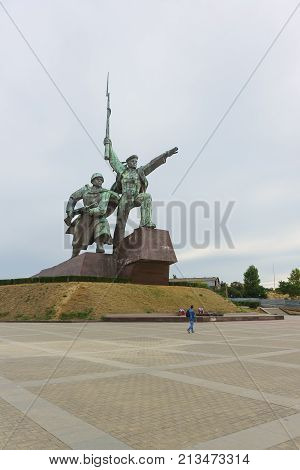 Tourists Near The Monument To The Feat Of The Defenders Of Sevastopol During The Second World War Th