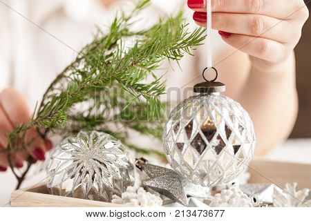 Christmas time decoration in female hand close up