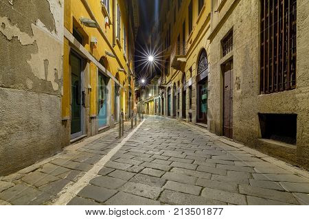 Old medieval street in the historical part of the city. Milan. Italy. street at night.