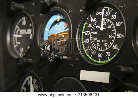 Close-up of some instruments in a helicopter cockpit in Robinson
