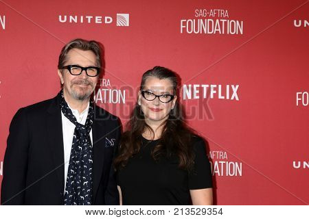 LOS ANGELES - NOV 9:  Gary Oldman, Gisele Schmidt at the Patron of the Artists Awards 2017 at Wallis Annenberg Centeron November 9, 2017 in Beverly Hills, CA