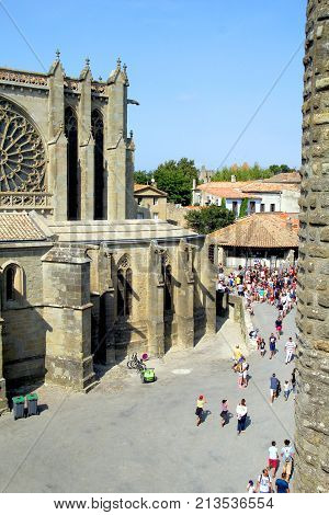 Carcassonne, Languedoc-roussillon, France - August 24 2017: Tourists Around The Basilique Saint Naza