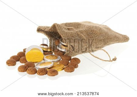 Bag with Dutch ginger nuts and chocolate coins for typical Sinterklaas holidays