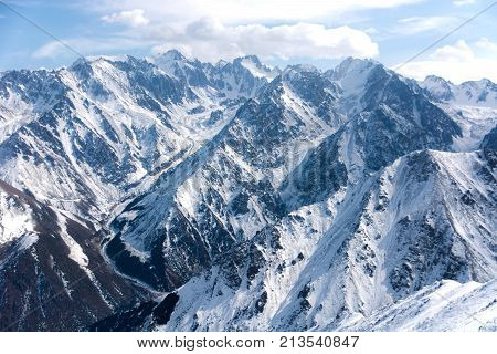 Wonderful mountain landscape in Kyrgyzstan (snow highland peak)