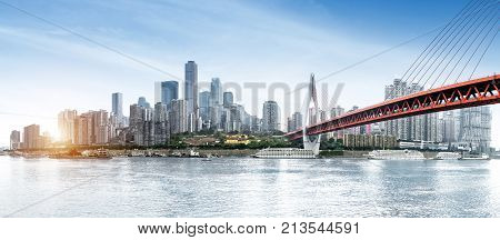 andscape of downtown near water of chongqing in blue sky