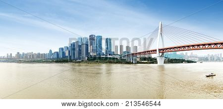 andscape of downtown near water of chongqing in blue sky