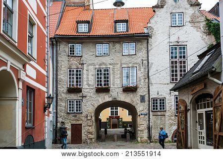 Tourists Near Swedish Gate In Riga City