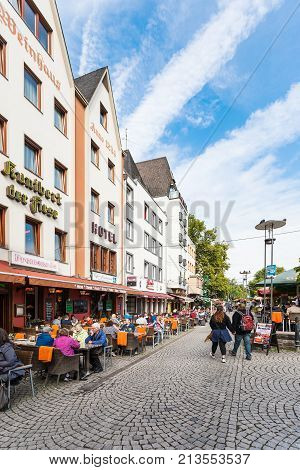Tourists On Am Bollwerk Promenade In Cologne City