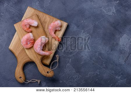 Frozen Shrimp On Cutting Board