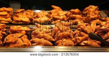 Fragrant Brioches And Pastries In The Bar With A Mirror