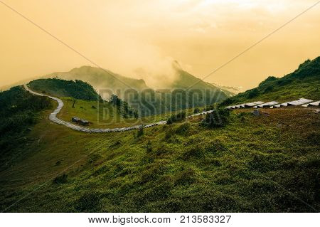 Winding hiking path along a grassy mountain ridge on the Caoling Historic Trail on Taiwan's east coast