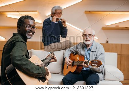 Senior Friends Playing Music