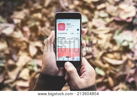 CHIANG MAI THAILAND - Nov 102017: Apple iPhone 6s with Airbnb application on the screen. Airbnb is a website for people to list find and rent lodging.