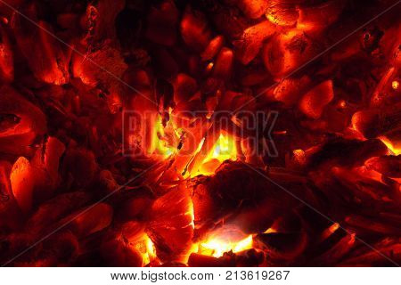 background from the burning of coal . Photo of an abstract texture