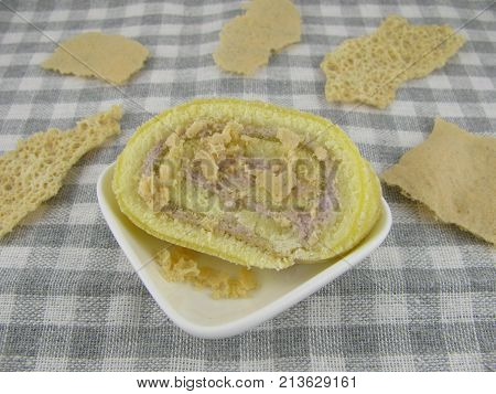 Glutenfree biscuit roll slices with crunchy biscuit pieces