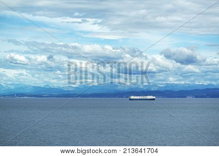 KOPER SLOVENIA - SEPTEMBER 3 2017: Eukor cargo ferry ship delivers ocean-transport and logistics services to global automotive industry arrives to Port of Koper in Slovenia.