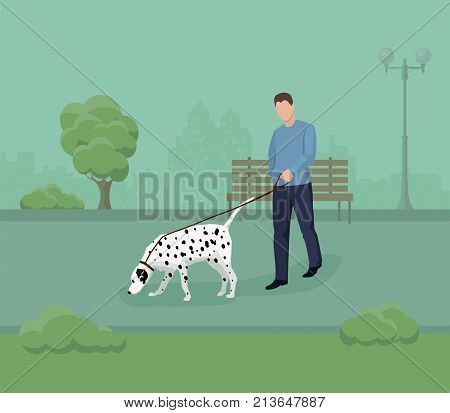 A man walking with a dog in the park