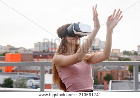 Amazed Young Beautiful Girl Using New Vr Technology