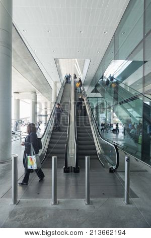 ZAGREB AIRPORT - 24 APRIL 2017: Passengers on escalators at Franjo Tudjman airport