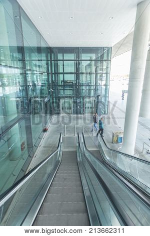 ZAGREB AIRPORT - 24 APRIL 2017: Passengers on escalators at Franjo Tudjman airport