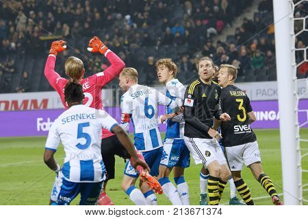 SOLNA SWEDEN - OCT 30 2017: Soccer player in the game AIK and IFK Gothenburg defending the goal after a corner. October 30 2017SolnaSweden