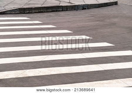 Marking a pedestrian crossing on the road for people's safety