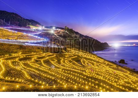 Wajima, Japan at Shiroyone Senmaida rice terraces night light up.