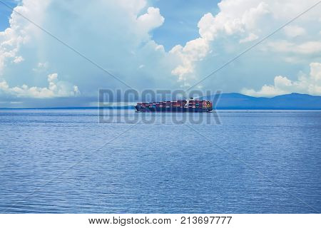 Massive freighters in the Strait of Juan de Fuca near British Columbia