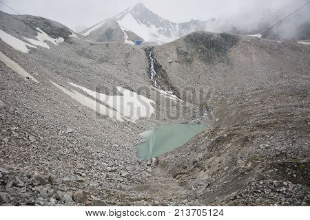 Landscape in mountains of Kyrgyzstan (lake mountains peak highlands)