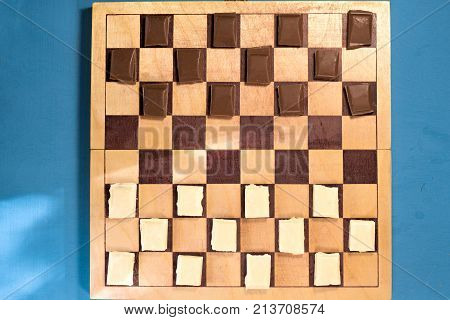 Two bars of chocolate on a chessboard