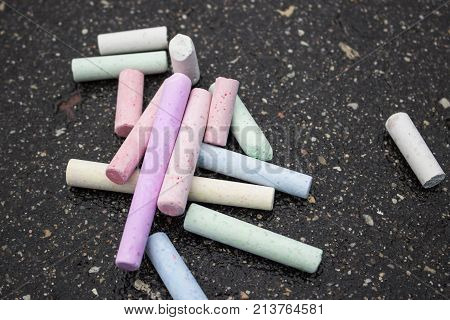 A Drawing with chalks asphalt colored crayons