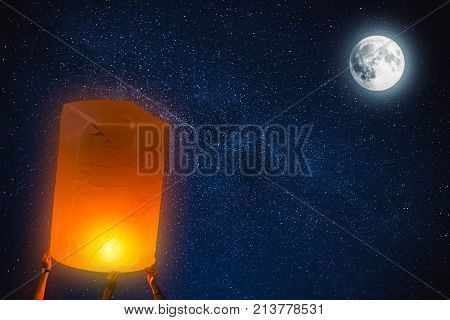 People Release Paper Fire Lamp Rising Over Night Sky Full Moon At Loy Krathong Festival Thailand