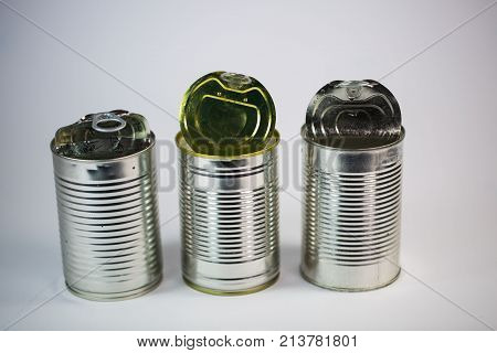 Tin cans on white background, shot, space, preserved