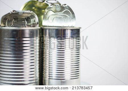 Tin cans on white background, close, white