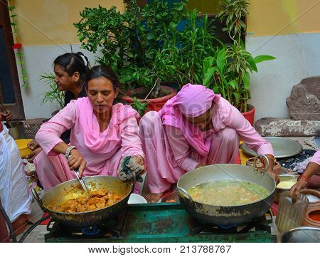 Indian Women Cooking Traditional Food